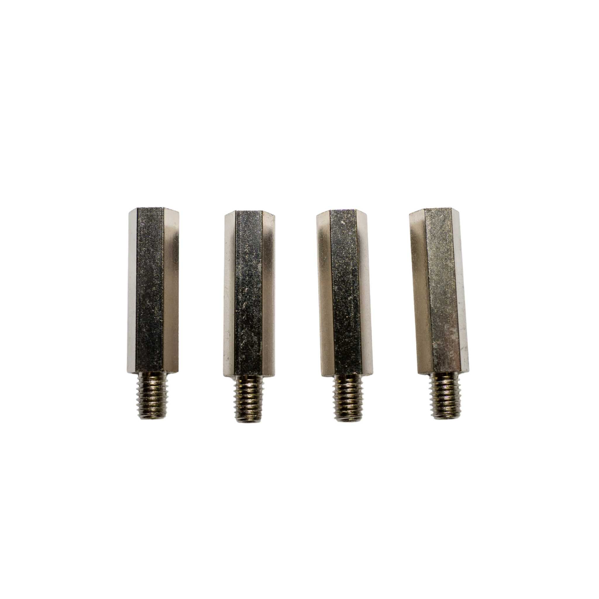 Four metallic hex bolts on a white background